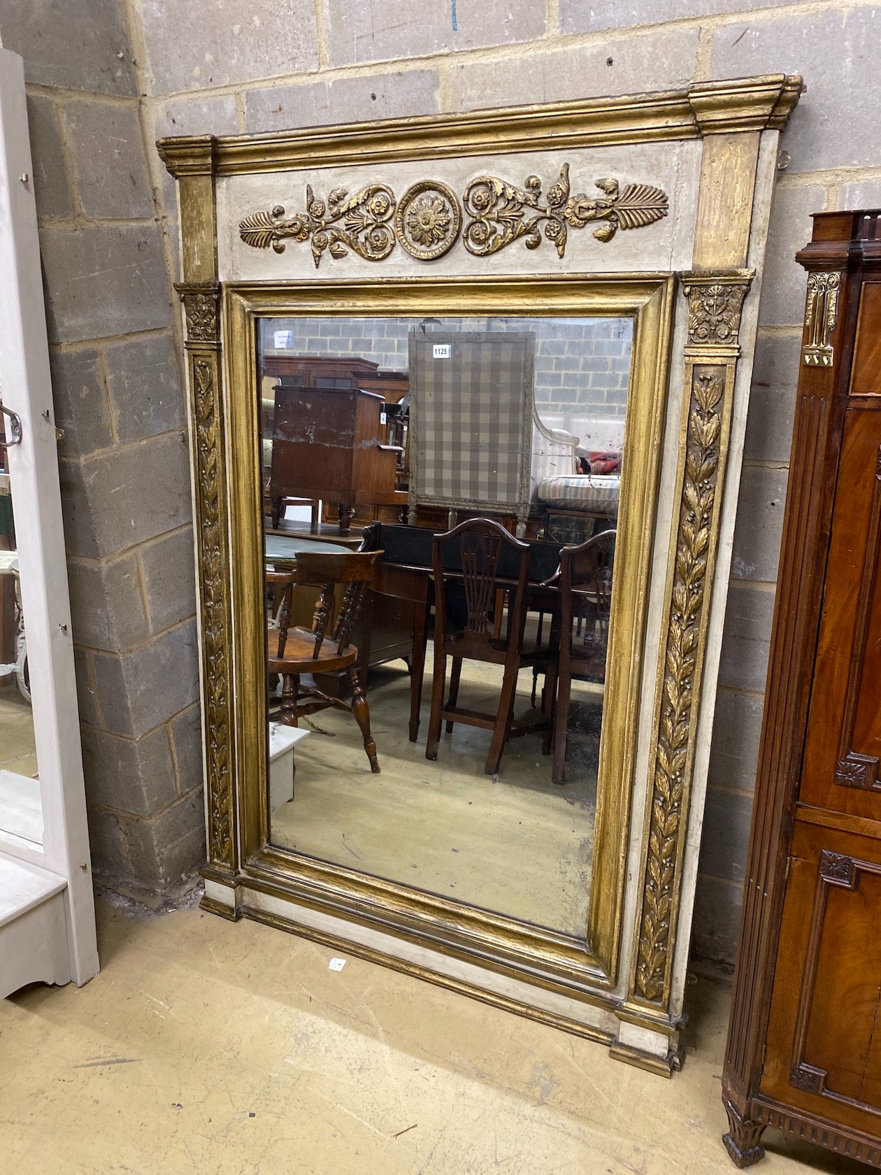 A 19th century painted parcelgilt overmantel mirror, width 122cm, height 174cm